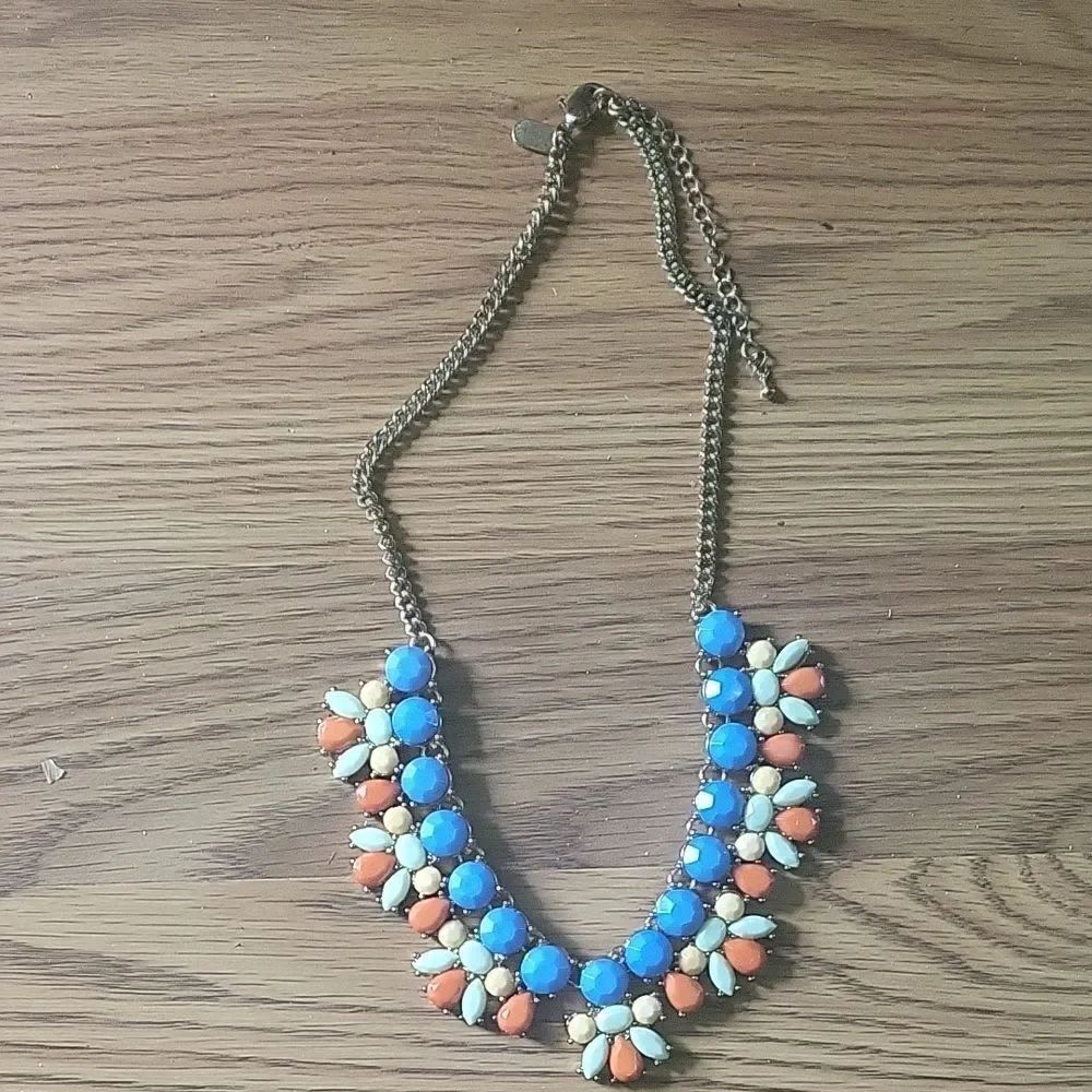 Gold-Tone Statement Necklace with Blue, Coral, and Cream Accents